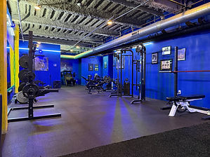 Astro Gym squat racks and free weights