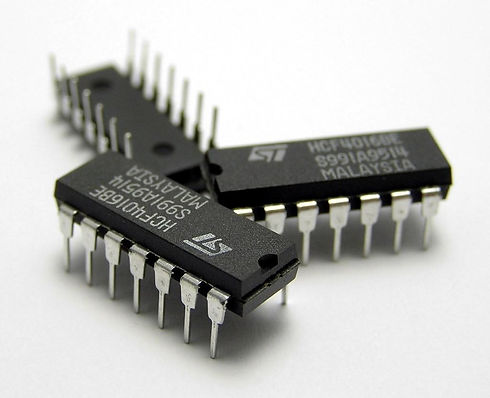 Three_IC_circuit_chips.jpg