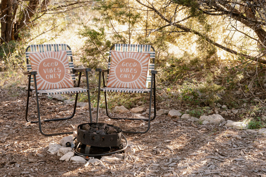 Fire pit and chairs at the Andorra Tent.