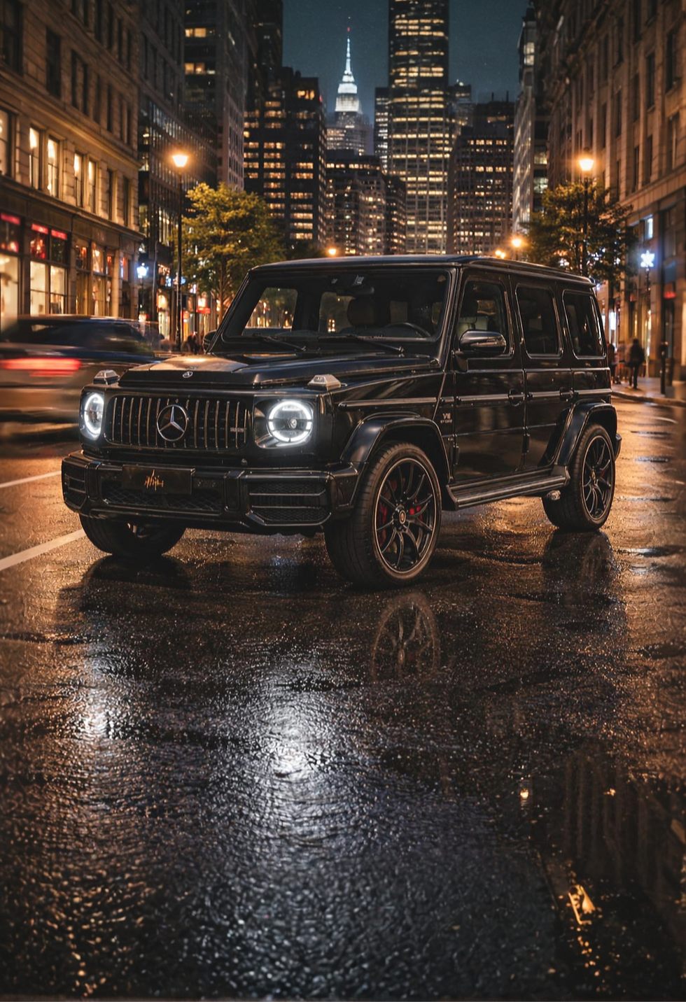 Black Mercedes-Benz G63 AMG driving through downtown Montreal street at night – luxury SUV rental Montreal