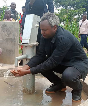 pastor henry and running water.jpg