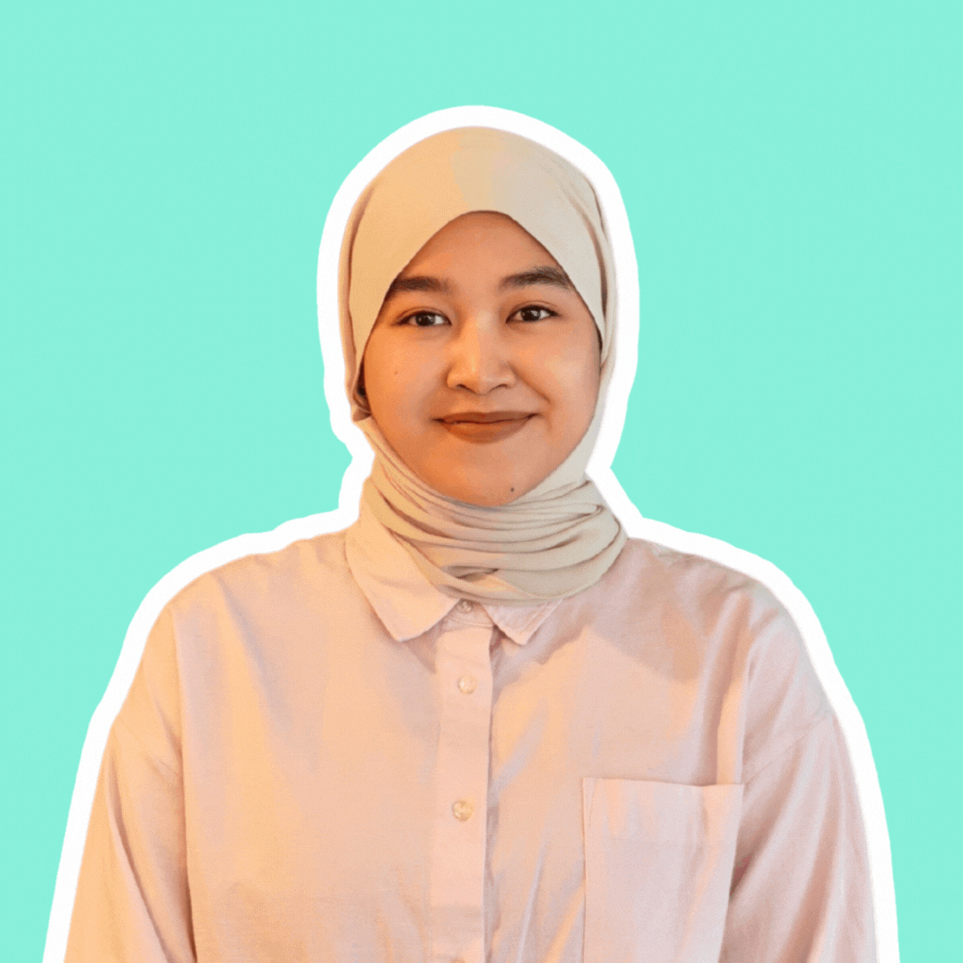 A gif of Najwa featuring her smiling and doing a fun pose after.