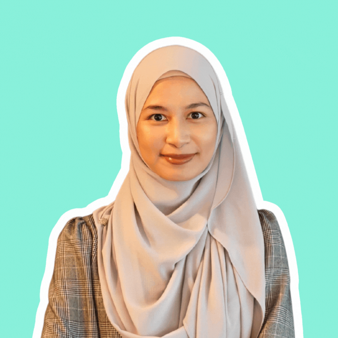 A gif of Nura featuring her smiling and doing a fun pose after.