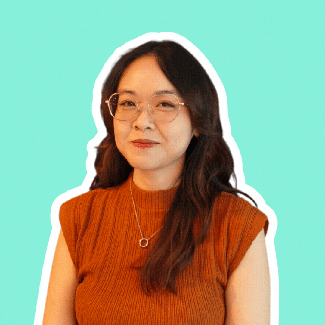 A gif of Natalie featuring her smiling and doing a fun pose after.