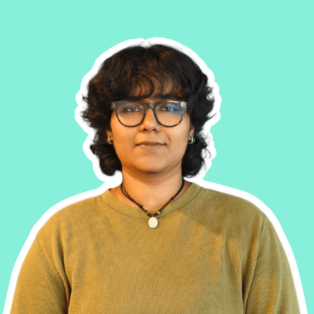 A gif of T featuring her smiling and doing a fun pose after.