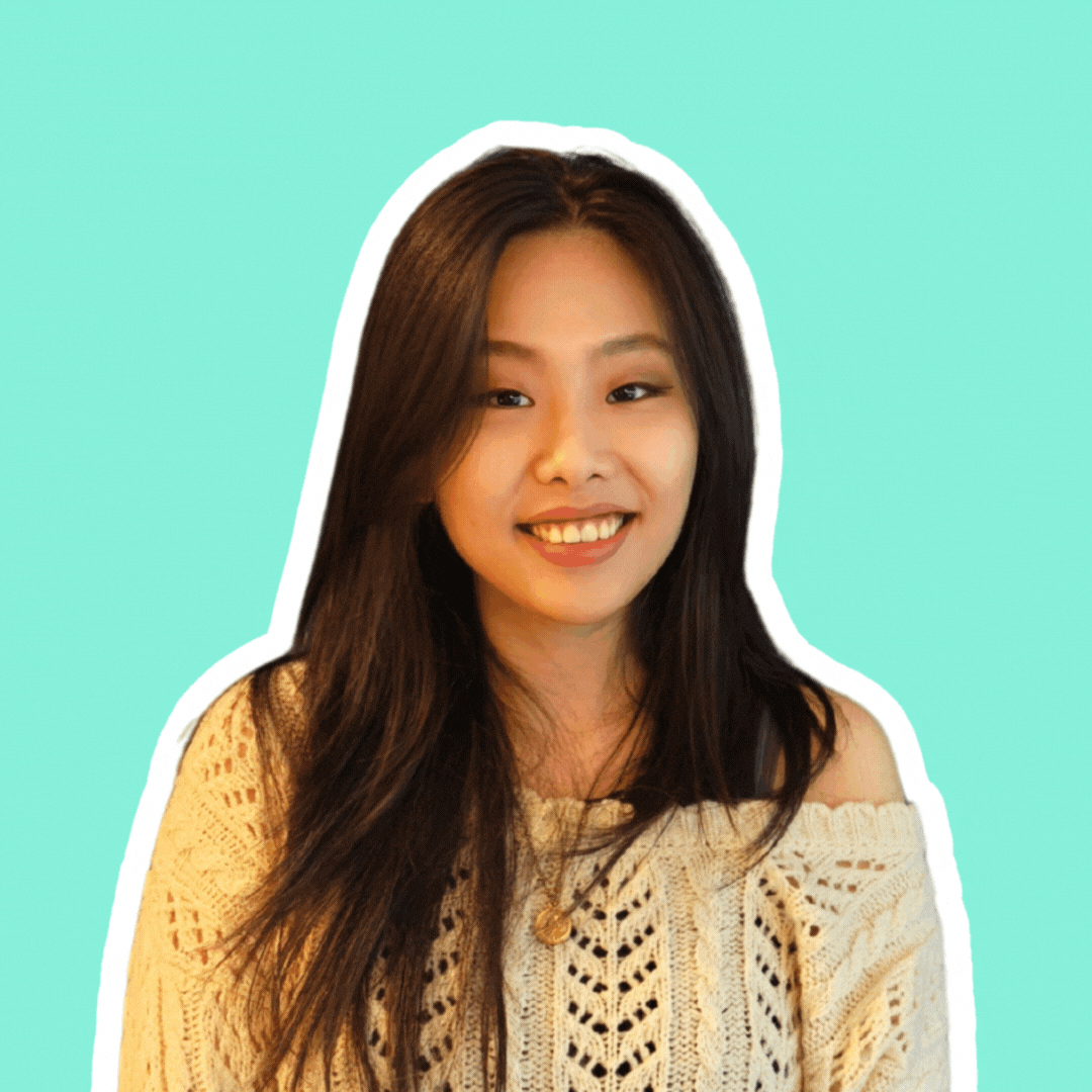 A gif of Cheng featuring her smiling and doing a fun pose after.