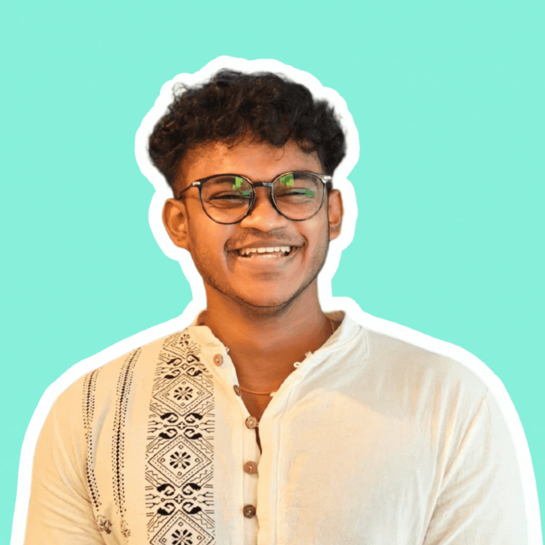 A gif of Viinesh featuring him smiling and doing a fun pose after.