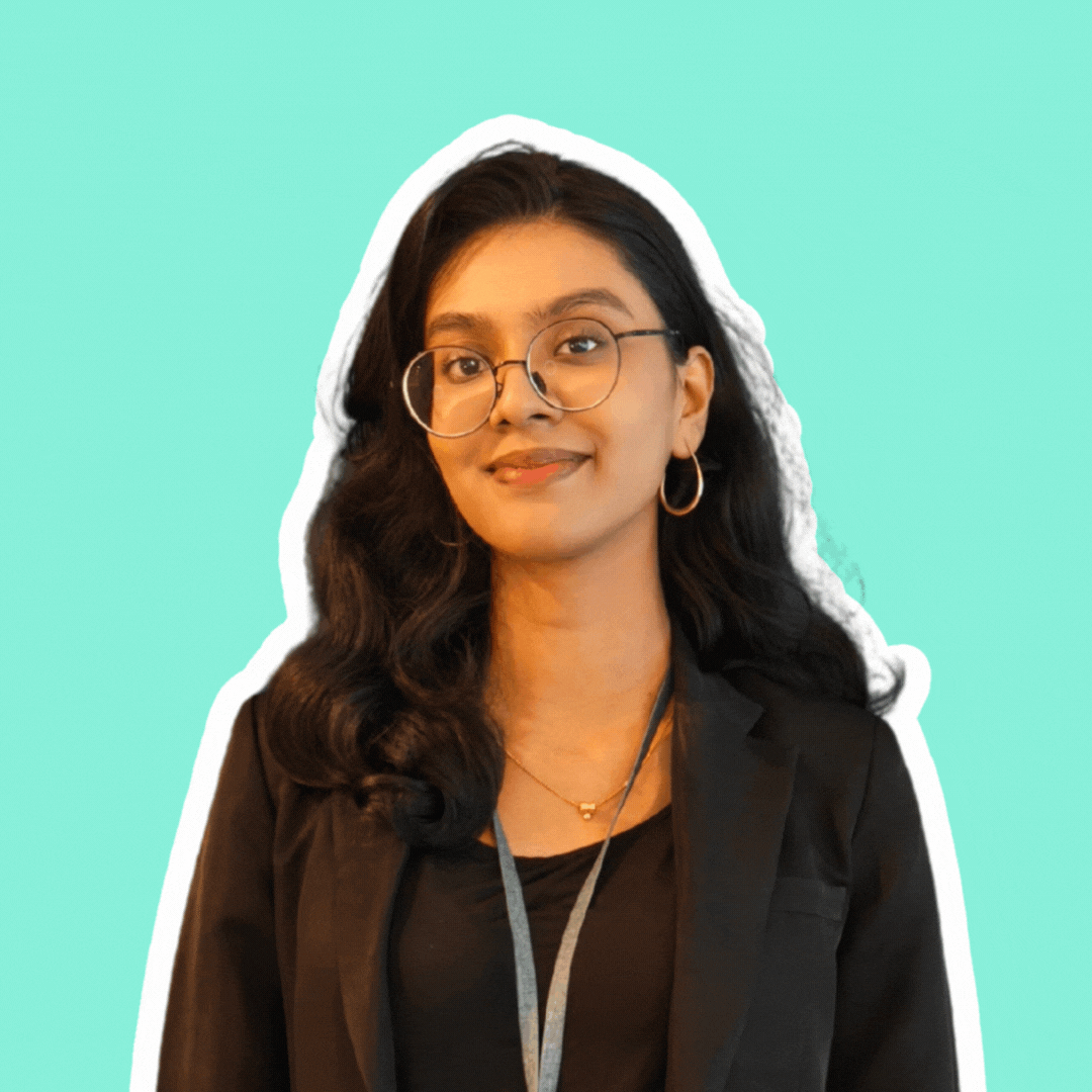 A gif of Heerti featuring her smiling and doing a fun pose after.