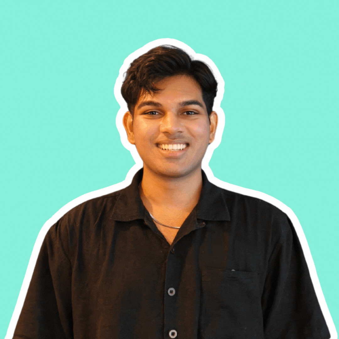 A gif of Ayrtton featuring him smiling and doing a fun pose after.