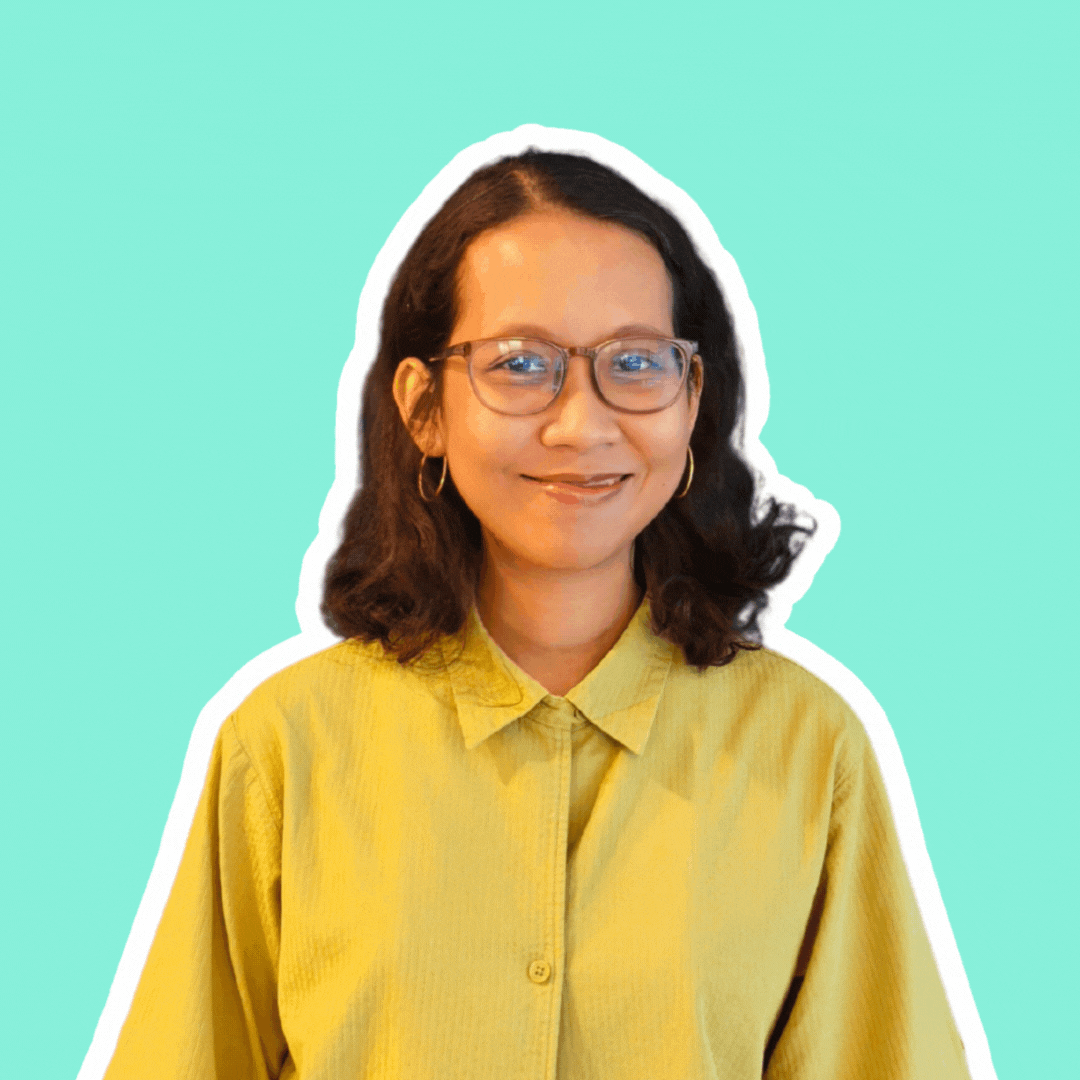 A gif of Mai featuring her smiling and doing a fun pose after.