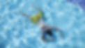 Young-man-lying-on-bottom-of-swimming-pool-top-view-1327065053_8192x5464.jpeg