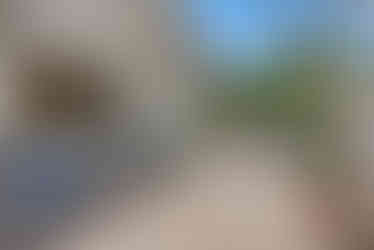 Spacious patio featuring a convenient kitchen pass-through window.