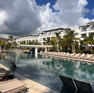 The main pool and swim-up pool bar at Secrets Tides