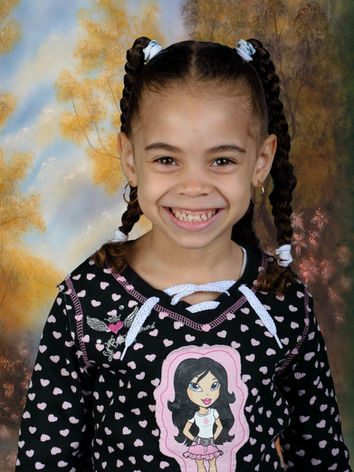 Student school portrait with professionally applied background