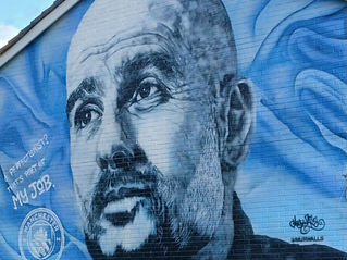 A mural of Pep Guardiola