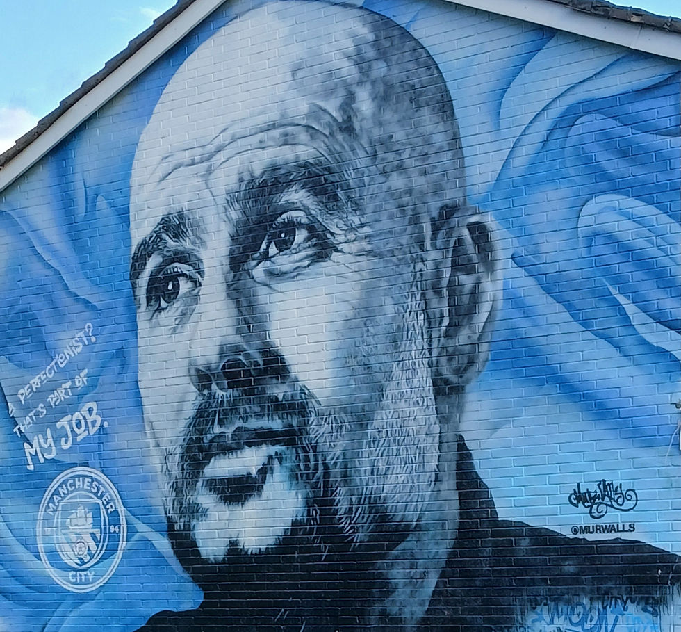 A mural of Pep Guardiola
