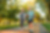Beautiful sporty healthy active cheerful smiling middle-aged couple going to workout outdo