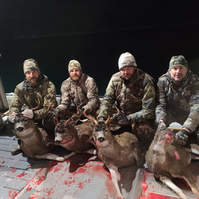 4 men 4 dead deer