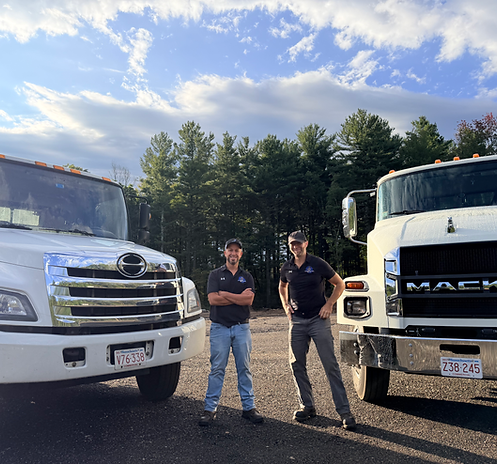 Josh Kleiner and Tom Hammond of I'll Take That Junk with roll-off dumpster trucks in Worcester County MA