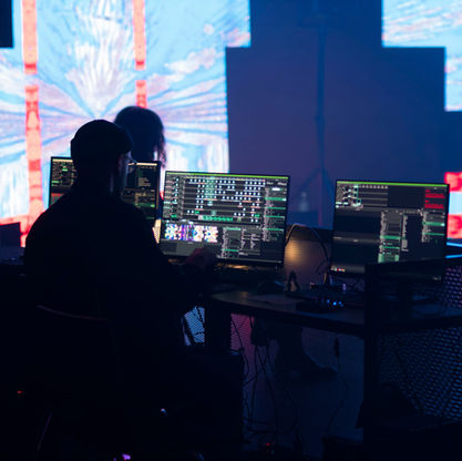 behind the scenes look of the video control booth for the led panels. 