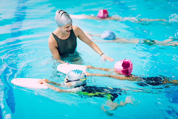 Aqua Boss LLC instructor teaching swimming lessons in Stockton CA pool