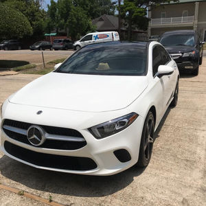 auto detail of a white Mercedes Benz 