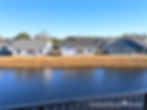 Looking from the deck of 243F2 at the completed homes across the waterway - Construction completed around Grand Palms Resort making for a more enjoyable Myrtle Beach Vacation.