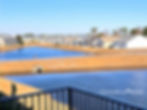 Looking left from the deck of 243F2 at the completed homes across the waterway - Construction completed around Grand Palms Resort making for a more enjoyable Myrtle Beach Vacation.