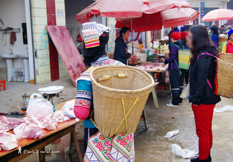 Yi lady buying meat