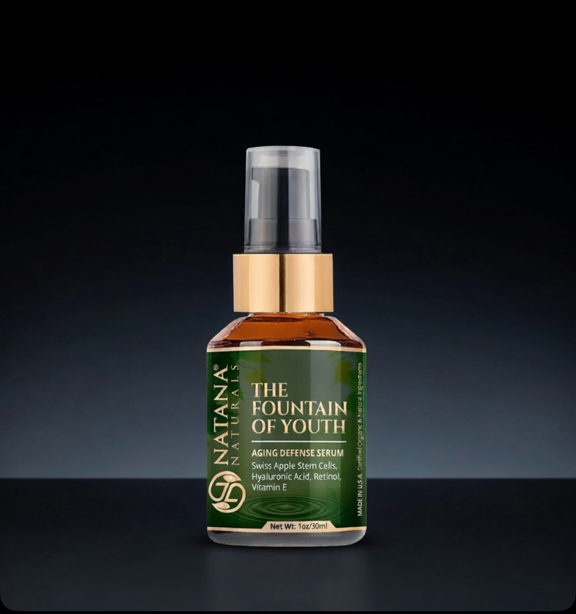 An amber glass bottle of The Fountain of Youth-Aging Defense Serum.