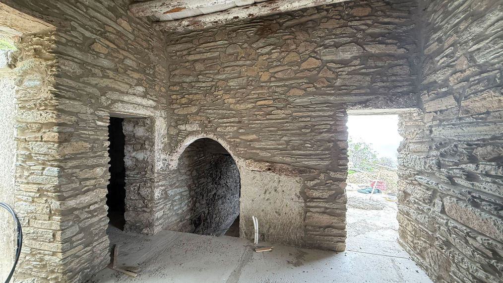 the inside after rennovationg a traditional stone built holiday retreat in Andros