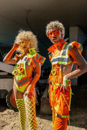 Big Sis wearing construction themed outfits designed by Chase Koopersmith, Glitteris.