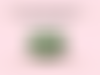 Rose and blue chamomile essential oil bottles with gradient background from soft pink to brown, text reads "Protection and Clarity Through Plant Chemistry