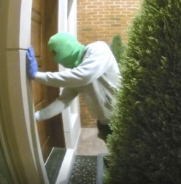 Masked man steals package from porch