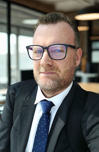 Portrait of a man in a suit and tie