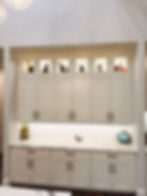 Modern white kitchen cabinets with glass top displays