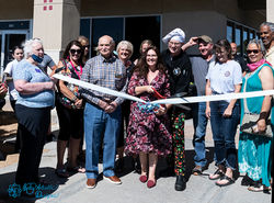 Essence ribbon cutting