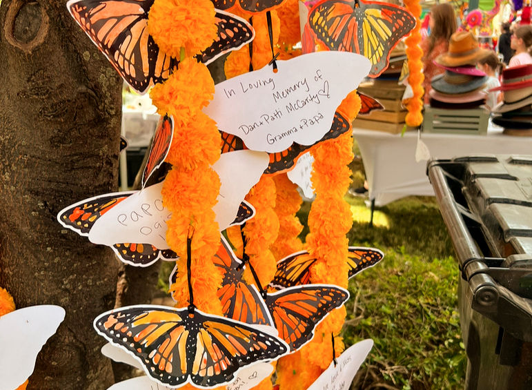 Loving message written grand parents at the monarch messages section, adorned with marigolds.