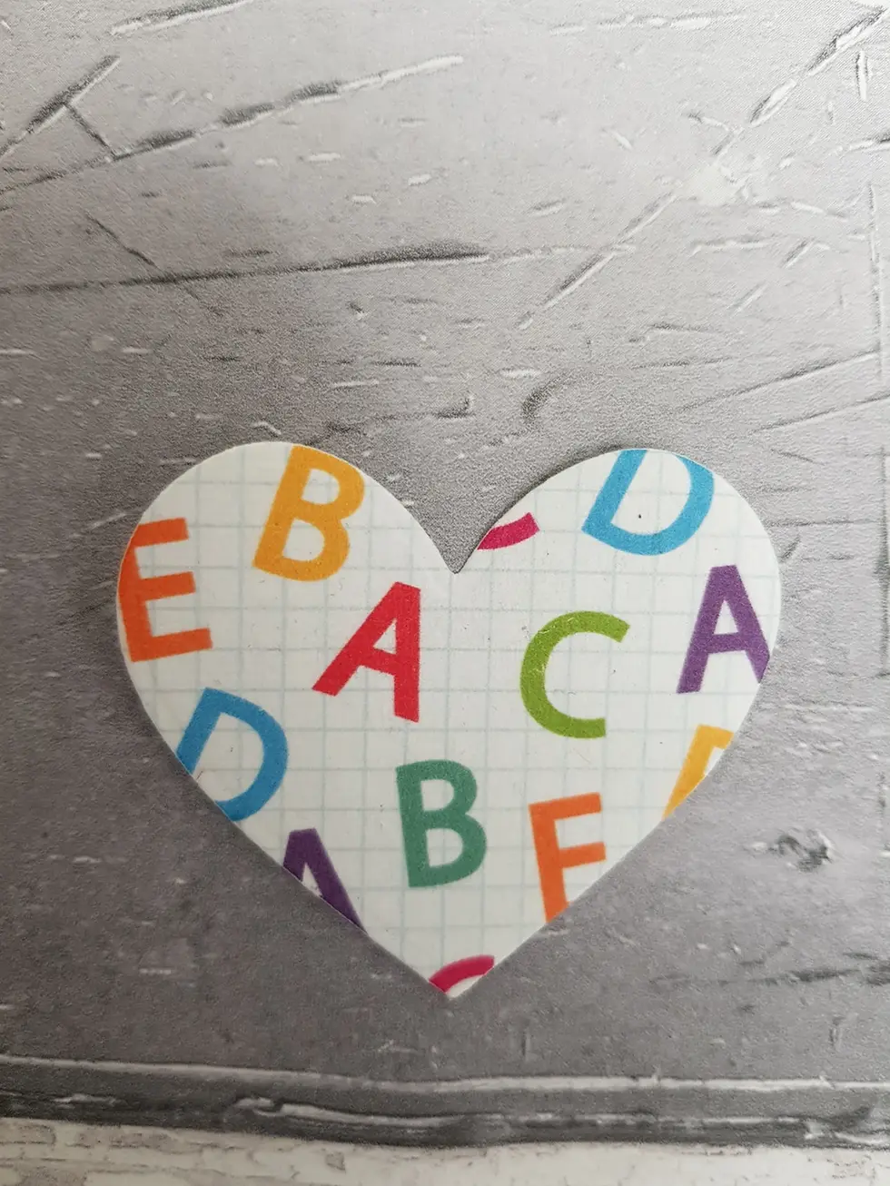 Thumbnail: alphabet themed teacher plantable wildflower seed heart close up