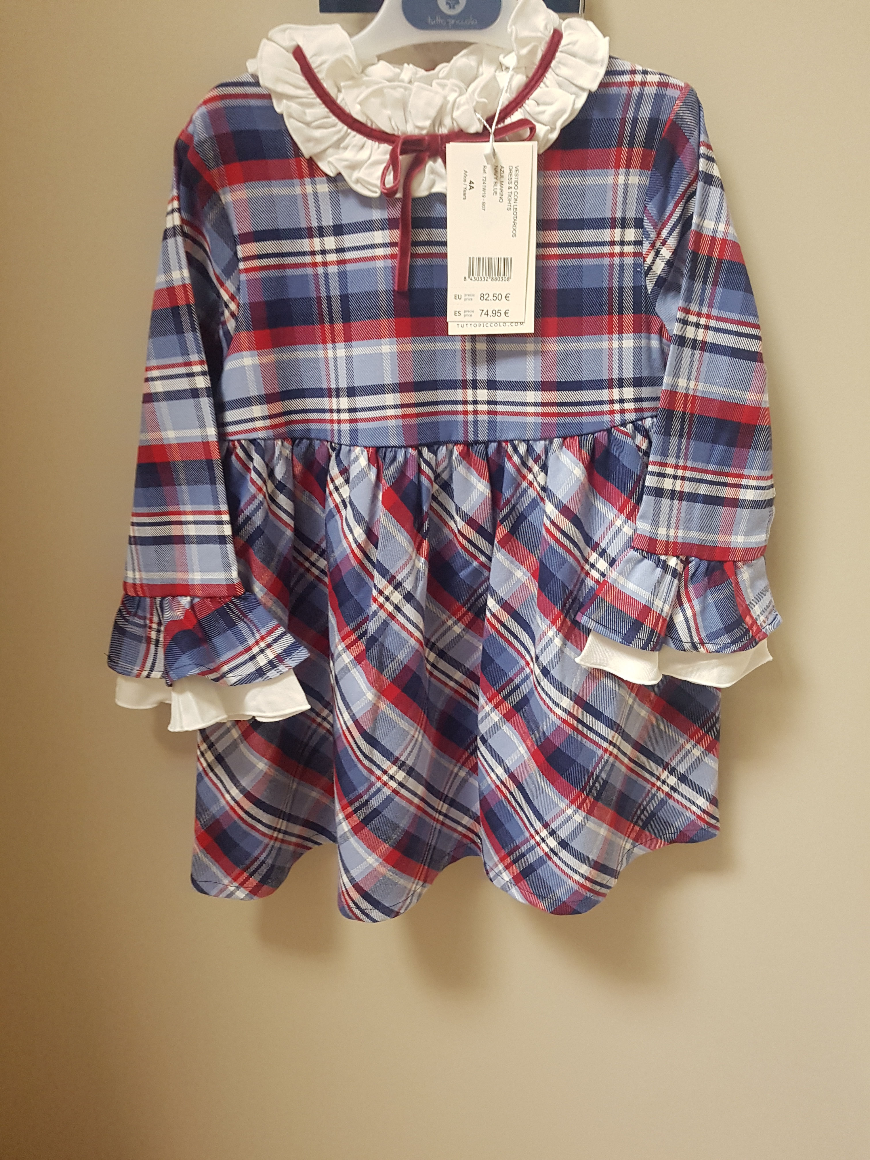 Tutto Piccolo dress with red tights