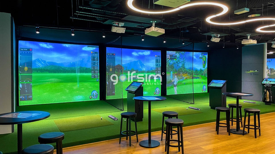 Multiple commercial golf simulator bays by Golfsim Australia, featuring premium impact screens and real-time ball tracking technology.
