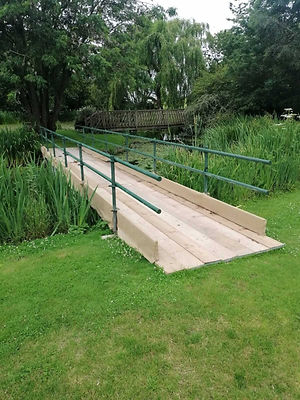 temporary scaffold platform bridge over stream