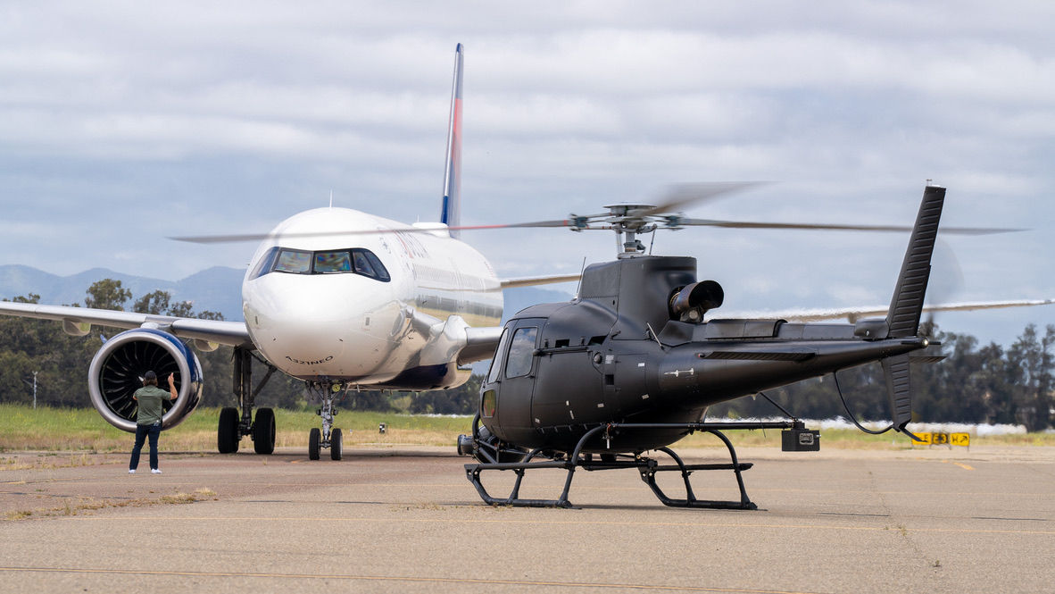 Beside an airliner on the ramp