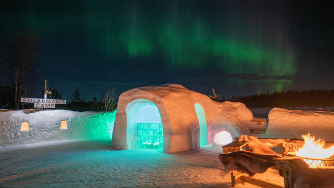 Northern Lights tour in Levi, Lapland, in Snow Igloo Park with Scandinavian Travel Group. Experience Polarman's Camp and Snow Igloo Park: An Enchanting Arctic Adventure

Welcome to Polarman's Camp and Snow Igloo Park, an exclusive haven just outside Levi, Finland (Lapland), where the magic of the Northern Lights and the charm of a Snow Igloo Park await you. Escape the tourist buzz and immerse yourself in a serene atmosphere with an unobstructed Northern horizon view, a panoramic 360⁰ sky view, minimal light pollution, and a cozy Aurora dome shelter!