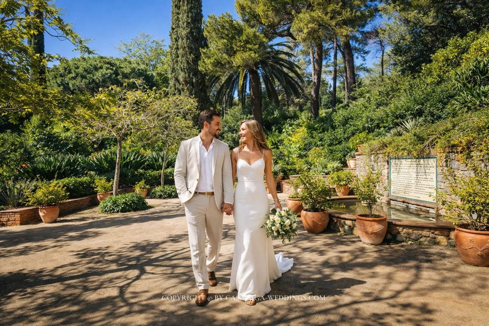 Bride and groom descending garden staircase at Jardines Marimurtra, Blanes, Costa Brava Spain