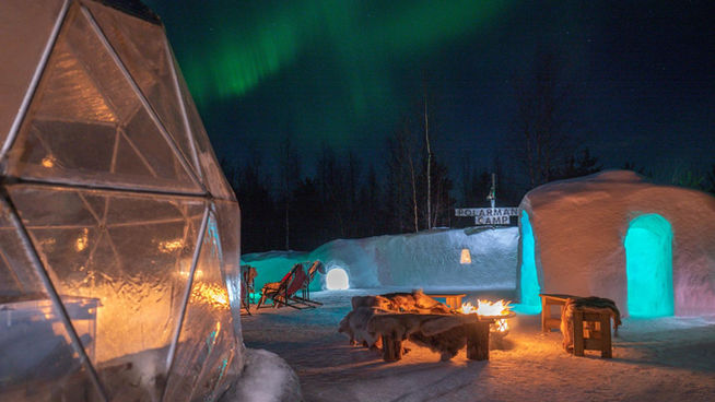 Northern Lights tour in Levi, Lapland, in Snow Igloo Park with Scandinavian Travel Group. Experience Polarman's Camp and Snow Igloo Park: An Enchanting Arctic Adventure

Welcome to Polarman's Camp and Snow Igloo Park, an exclusive haven just outside Levi, Finland (Lapland), where the magic of the Northern Lights and the charm of a Snow Igloo Park await you. Escape the tourist buzz and immerse yourself in a serene atmosphere with an unobstructed Northern horizon view, a panoramic 360⁰ sky view, minimal light pollution, and a cozy Aurora dome shelter!