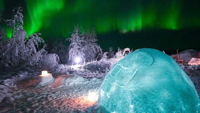 Northern Lights tour in Levi, Lapland, in Snow Igloo Park with Scandinavian Travel Group. Experience Polarman's Camp and Snow Igloo Park: An Enchanting Arctic Adventure

Welcome to Polarman's Camp and Snow Igloo Park, an exclusive haven just outside Levi, Finland (Lapland), where the magic of the Northern Lights and the charm of a Snow Igloo Park await you. Escape the tourist buzz and immerse yourself in a serene atmosphere with an unobstructed Northern horizon view, a panoramic 360⁰ sky view, minimal light pollution, and a cozy Aurora dome shelter!