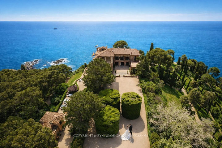 Wedding couple in Mermaid Garden at Casa de Santa Clotilde estate, Lloret de Mar, Costa Brava Spain