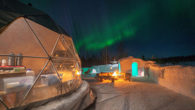 Northern Lights tour in Levi, Lapland, in Snow Igloo Park with Scandinavian Travel Group. Experience Polarman's Camp and Snow Igloo Park: An Enchanting Arctic Adventure

Welcome to Polarman's Camp and Snow Igloo Park, an exclusive haven just outside Levi, Finland (Lapland), where the magic of the Northern Lights and the charm of a Snow Igloo Park await you. Escape the tourist buzz and immerse yourself in a serene atmosphere with an unobstructed Northern horizon view, a panoramic 360⁰ sky view, minimal light pollution, and a cozy Aurora dome shelter!