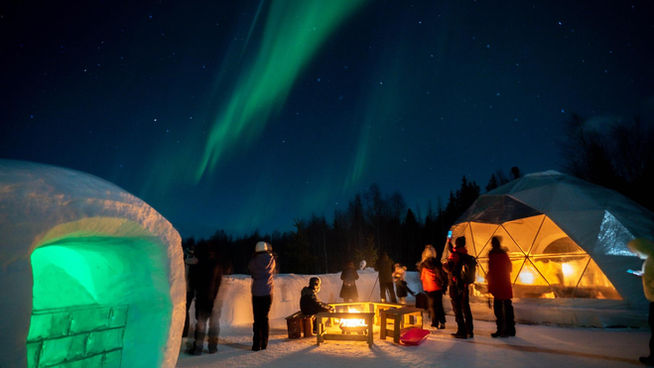 Northern Lights tour in Levi, Lapland, in Snow Igloo Park with Scandinavian Travel Group. Experience Polarman's Camp and Snow Igloo Park: An Enchanting Arctic Adventure

Welcome to Polarman's Camp and Snow Igloo Park, an exclusive haven just outside Levi, Finland (Lapland), where the magic of the Northern Lights and the charm of a Snow Igloo Park await you. Escape the tourist buzz and immerse yourself in a serene atmosphere with an unobstructed Northern horizon view, a panoramic 360⁰ sky view, minimal light pollution, and a cozy Aurora dome shelter!